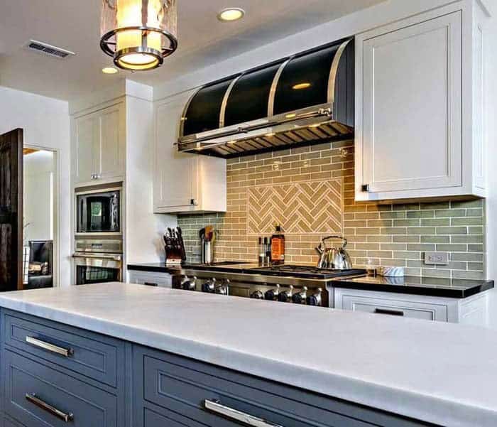 Herringbone Tile Inset In A Brick Tile Backsplash