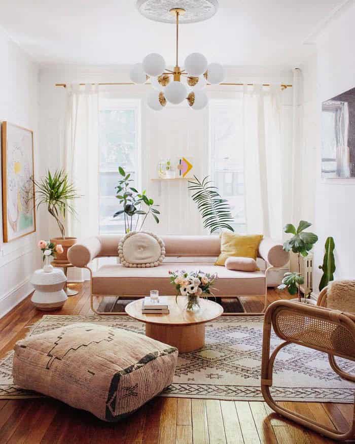 Tropical Living Room with Long Light Curtains and Plants