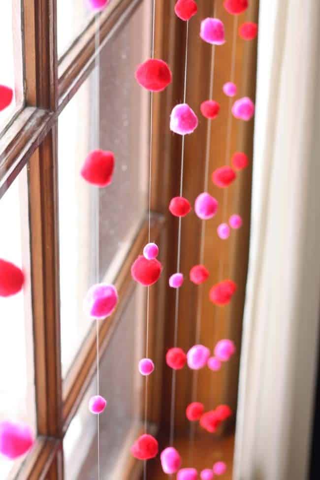 Add Colorful Flair to Your Window with Stringed Pom Poms