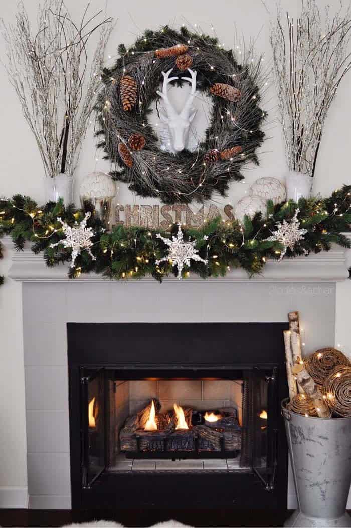 Add a Snowy Wreath with Deer Head Accent to Your Mantel