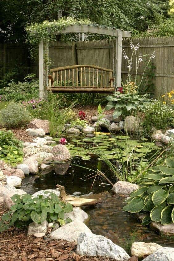 Large Rocks Around Pond and Pea Gravel Path