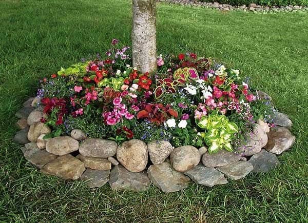 Easy Tree Trunk Flower Bed Idea