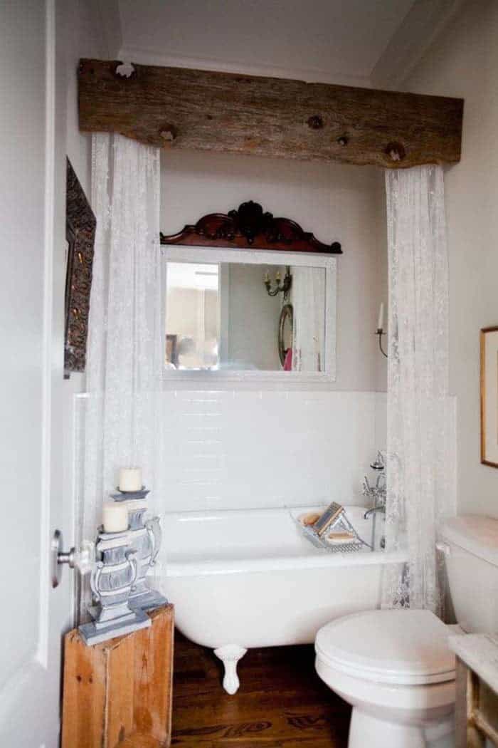 Clawfoot Tub And Dramatic Wood Beam Cornice