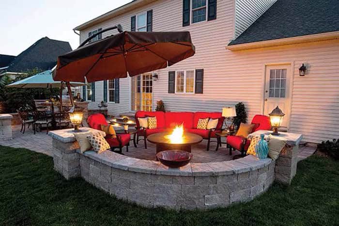 Perfect Outdoor Retreat with Sofas and Curved Stone Wall