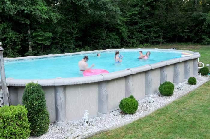 Uplift Your Backyard with a Majestic Oval Pool