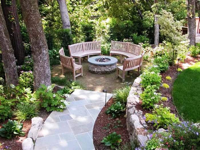 Delight Guests with Curved Benches and Forest Fire Pit