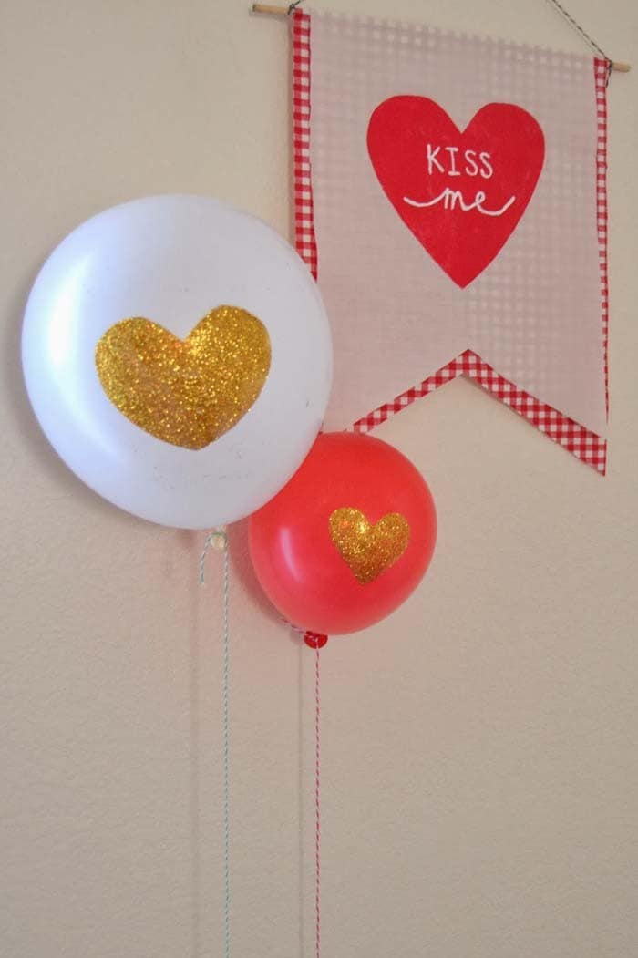 Place Shimmering Gold Hearts on Balloons