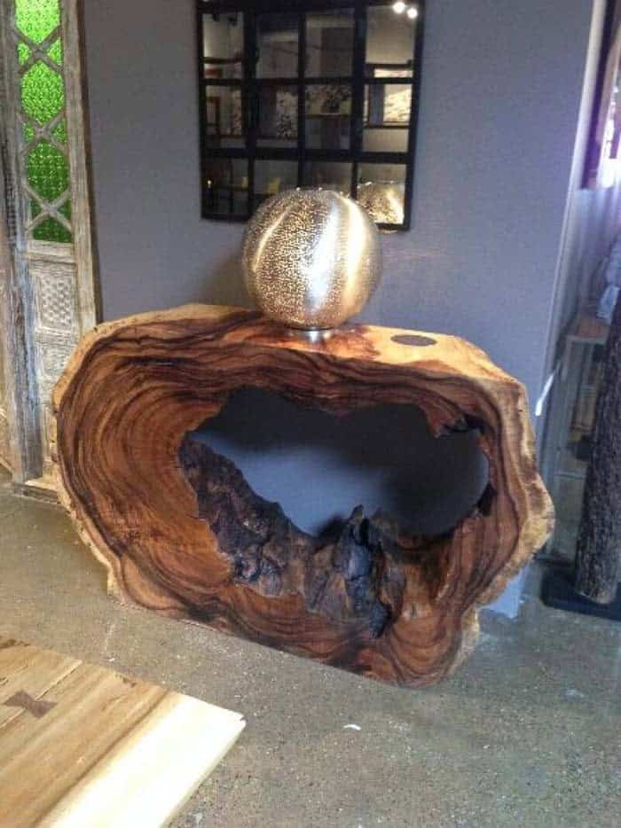 Add Artistic Charm with Handcrafted Tree Trunk Table