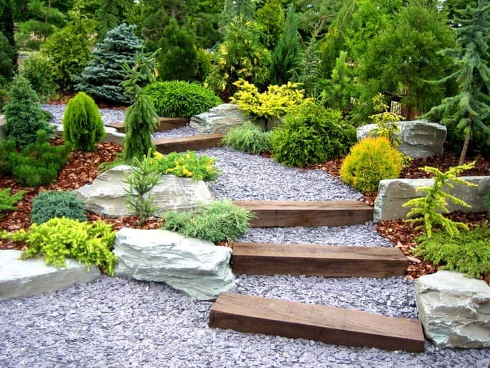 Provide Stability with White Gravel Rocks and Railroad Ties