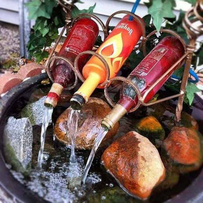 Water Feature From Wine Bottles and Rack