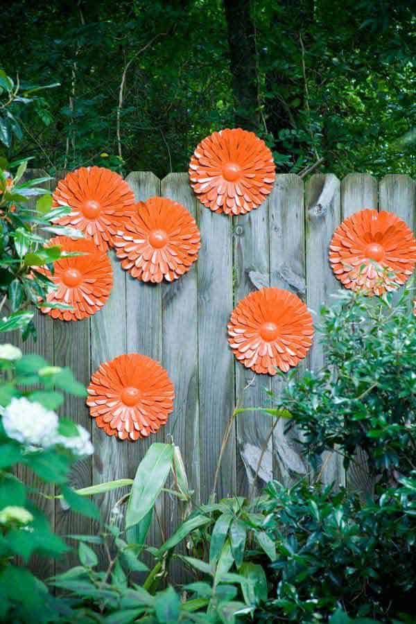 Adorn Your Garden Fence with Rustic Orange Flowers