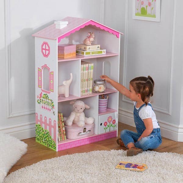 Use a Doll House as a Kids’ Book Storage Solution