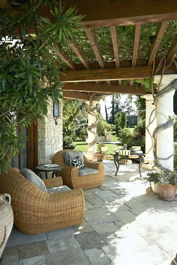 Rattan Armchairs With Plump Cushions Under Arbor