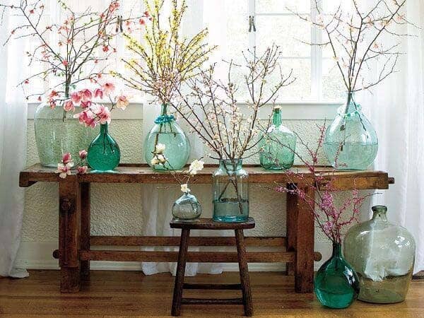 Vary Floral Branches In Glass Bottles