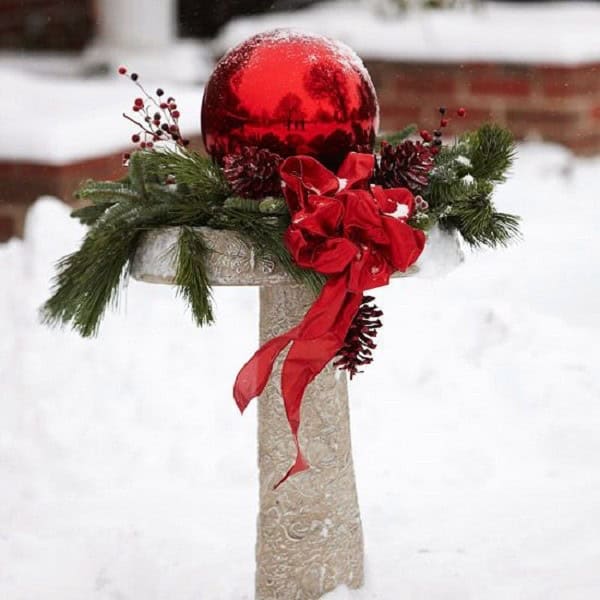 Upgrade Your Birdbath with a Big Red Ball Ornament