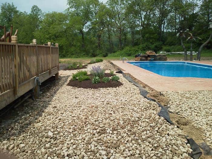 Add Intrigue to Your Pool with Gravel Landscape