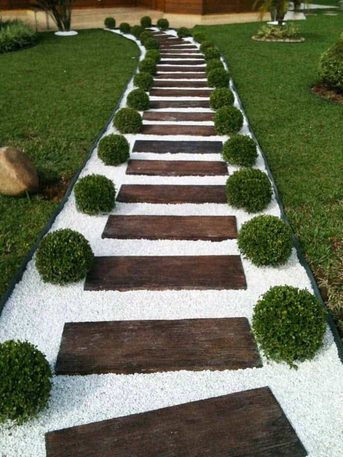 Create a Garden Walkway with Gravel and Wood Boards