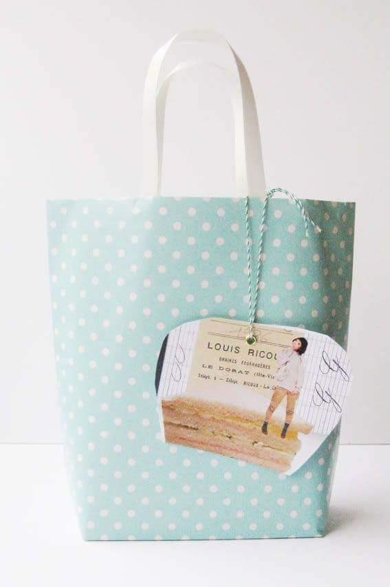 Turn Wrapping Paper into Gift Bags with Ribbon Handles