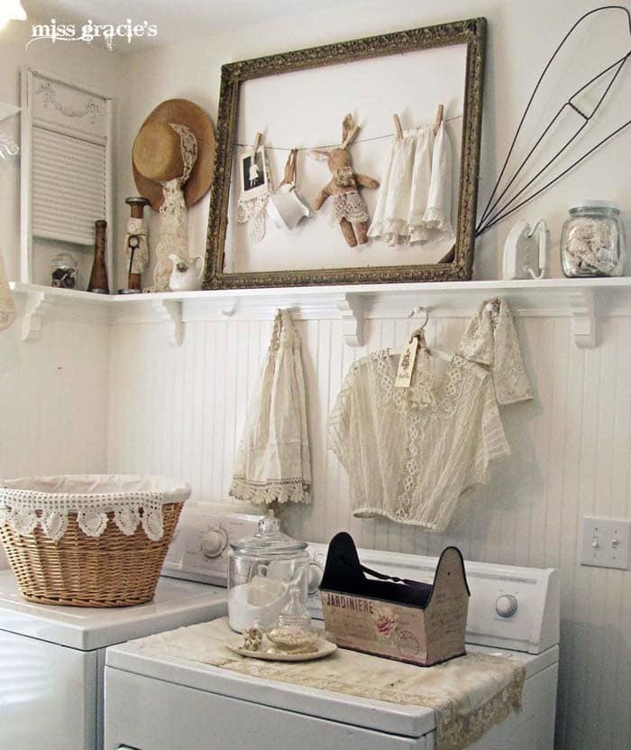 Antique Lace and Wicker Laundry Room with Framed Art Piece