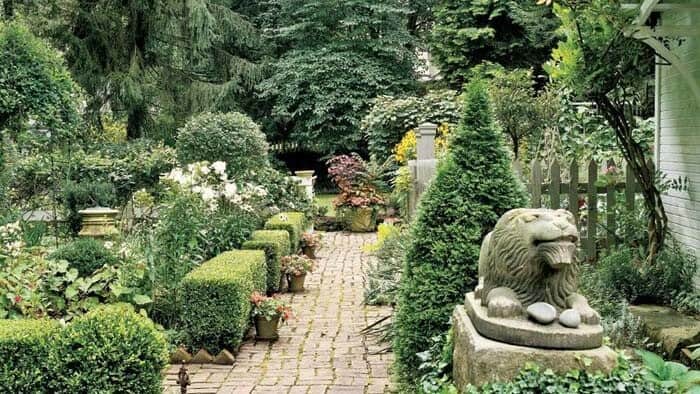 Transform Your Yard with Elegant Bushes and Sculptures