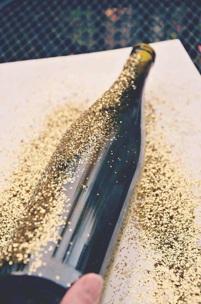 Glam Up Your Home with a Glitter-Covered Wine Bottle Décor