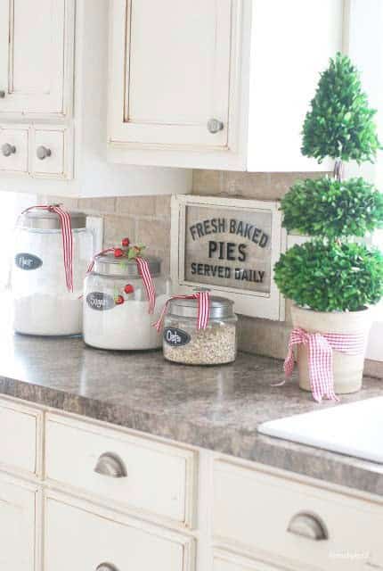 Turn Baking Canisters into Christmas Decor with Ribbons