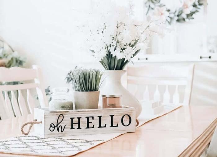 Centerpiece With Glass and a Whitewashed Box