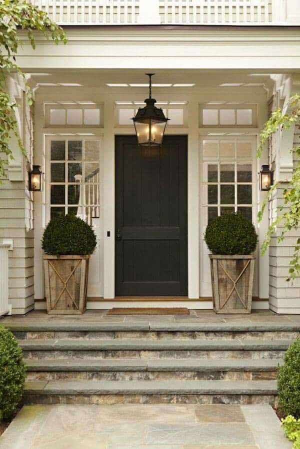 Dramatic Farmhouse Entry With Rustic Lanterns