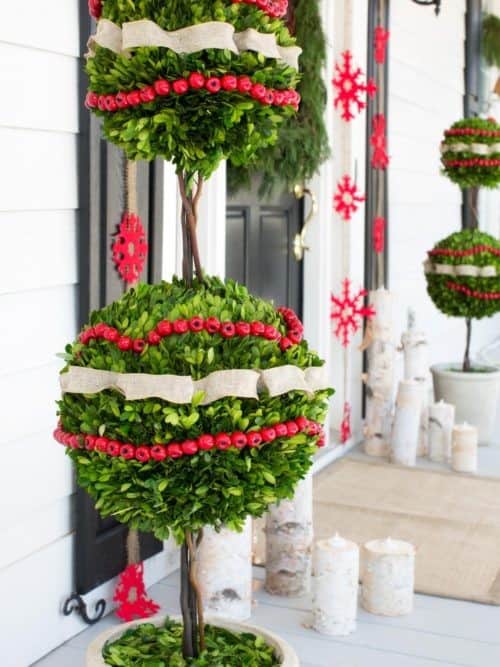 Indulge in the Lavish Look of Christmas Porch Topiaries