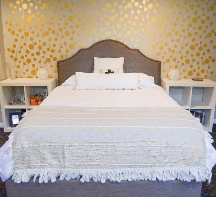 Gold Garlands On White Bedroom Wall