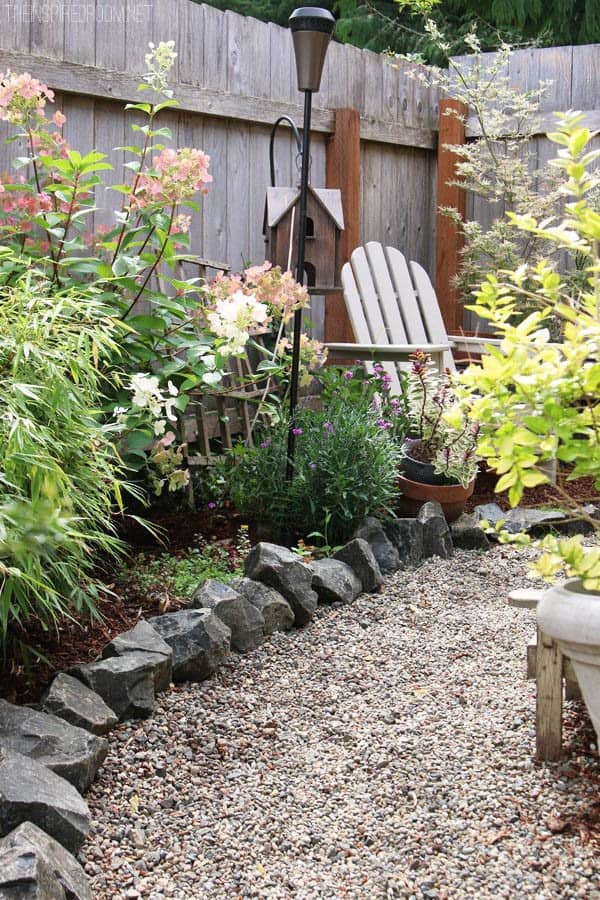 Border Your Fence Garden with Rough Stones