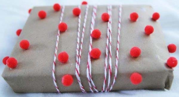 Add Flair to Package Wrapping with Twine and Pom Poms