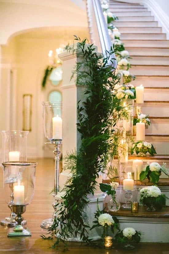 Enchant Your Stairway with Greenery and Candles