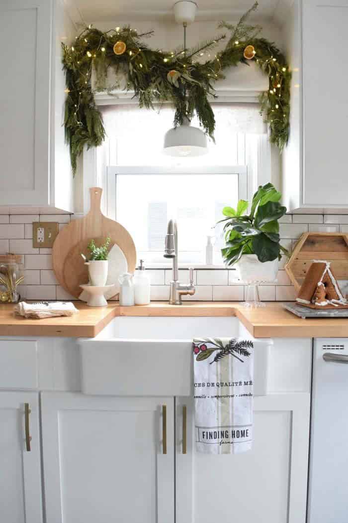 Decorating the Kitchen Sink with a Boxwood Garland