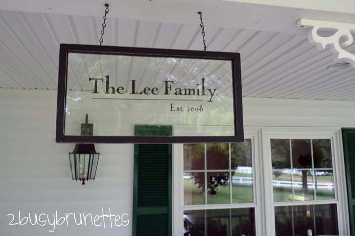 Add Elegance to Your Porch with a Hanging Glass Sign