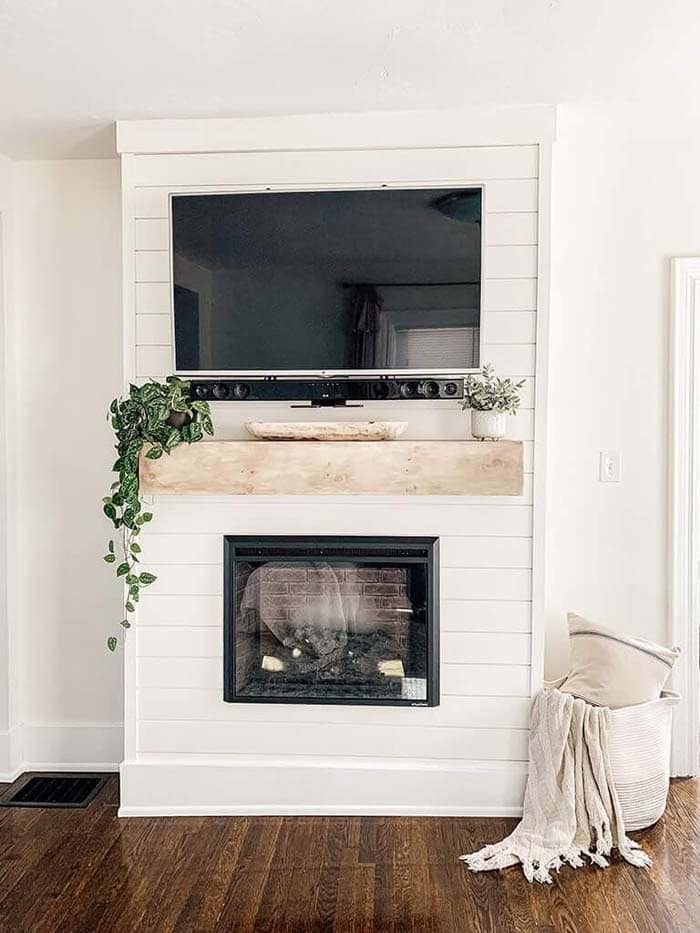 Enhance Fireplace and TV Unit with White Shiplap Boards