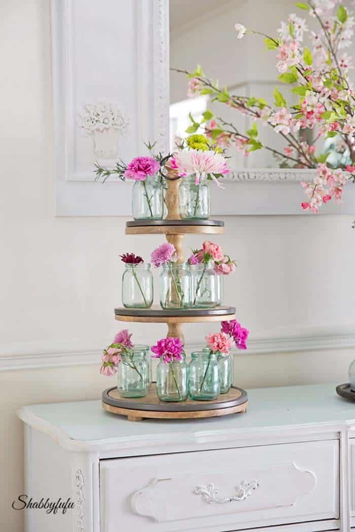 Single Blossoms Displayed on Cake Stand