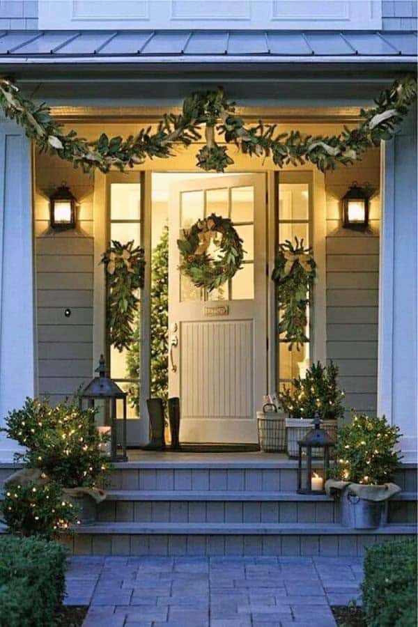 Adorn Your Porch with a Festive Greenery Garland and Wreath