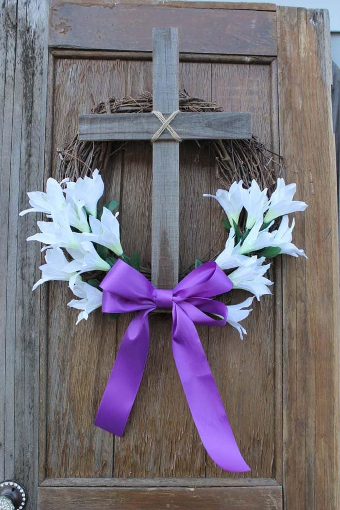 Wicker Wreath with Rustic Cross and White Flowers