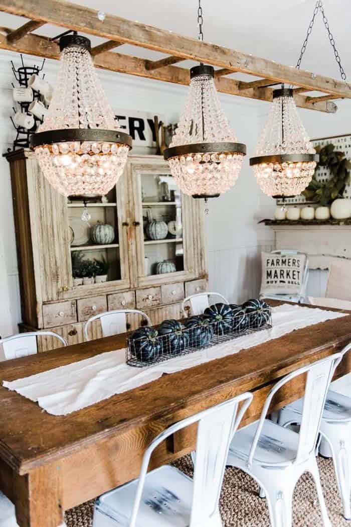 Rustic Ladder Grounds Glittering Chandeliers