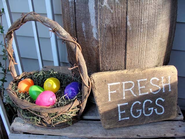 Place a Rustic Egg Sign with a Wooden Basket Accent