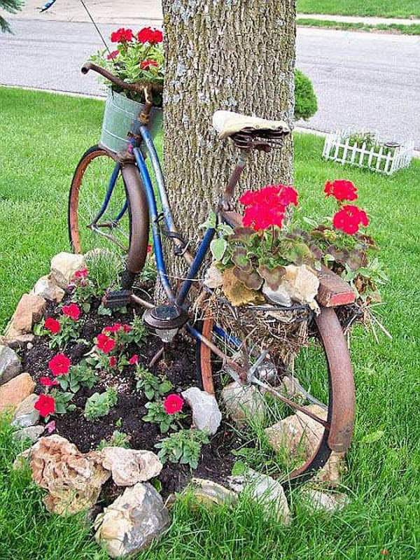 Use Large Rocks to Edge Your Rustic Bicycle Planter