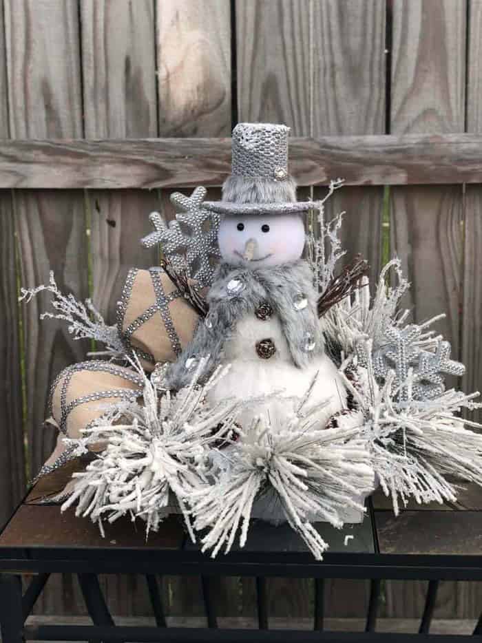 Celebrate Winter with a Stylish Silver Snowman Wreath