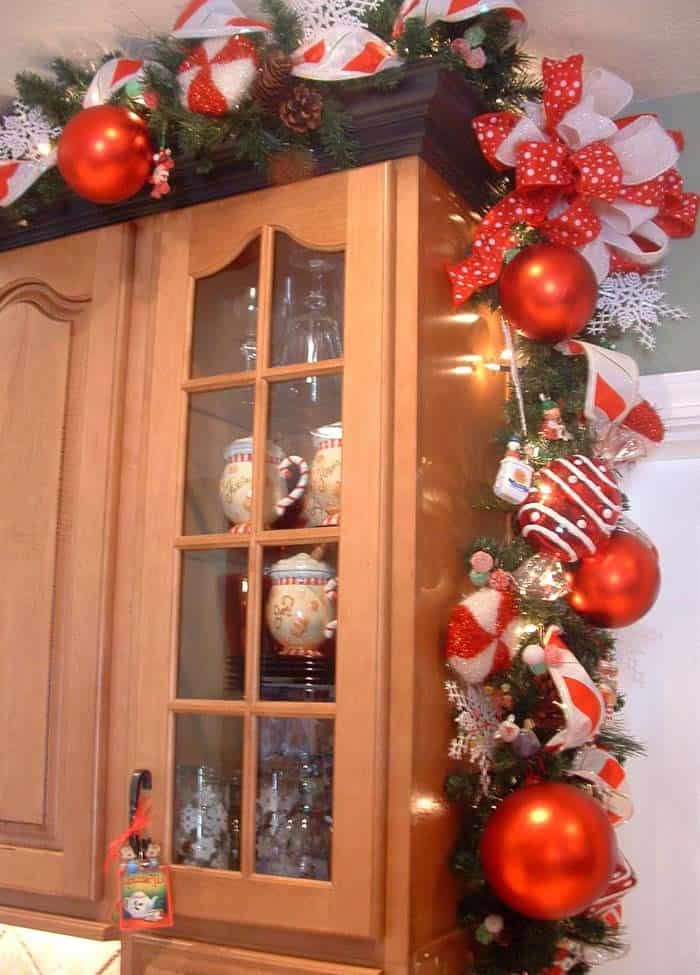 Illuminate Your Kitchen Cabinets with a Christmas Garland