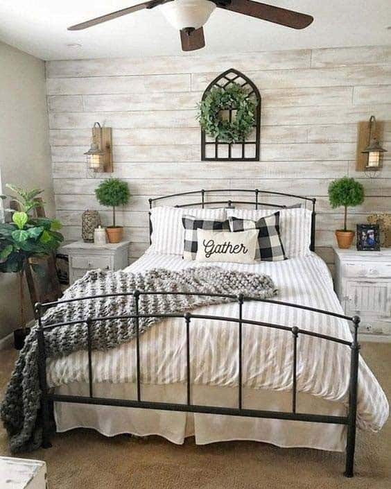 Rustic-Inspired Bedroom with Wood-Paneled Wall