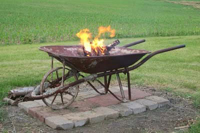 An Old Wheelbarrow Fire Pit