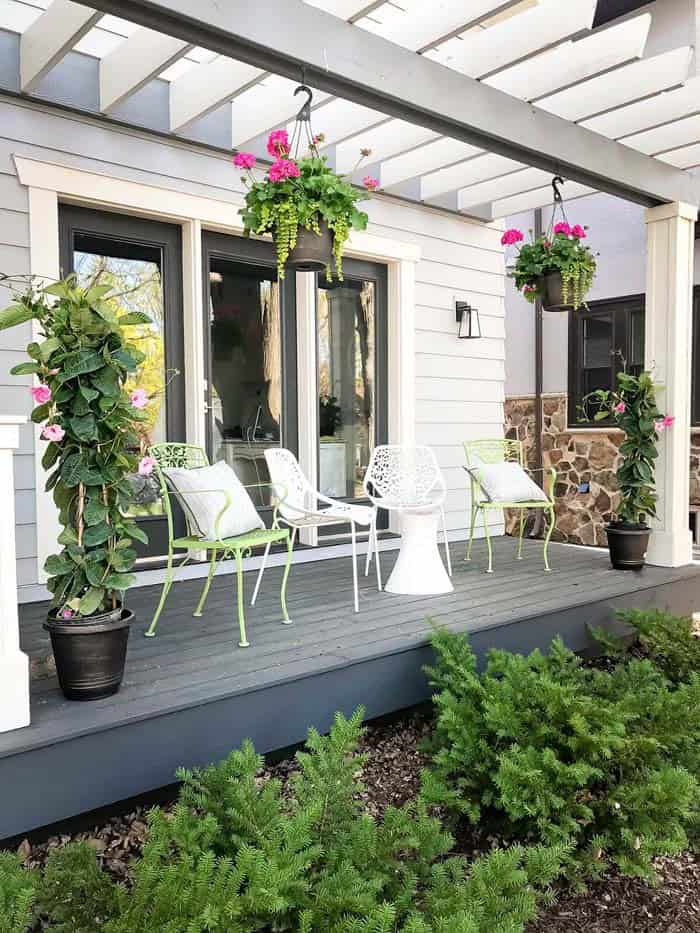 Patio with an Elegant Pergola and Floral Accents