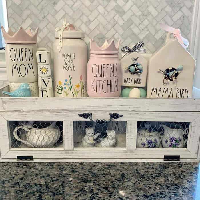 Pretty Storage Canisters On Free-Standing Display