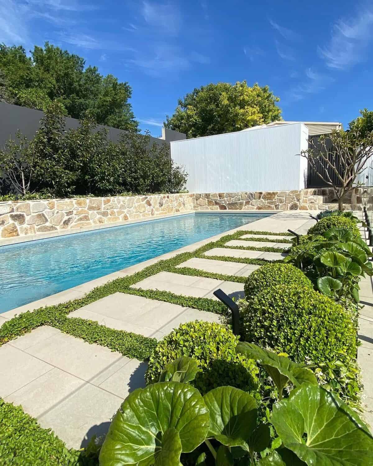 Stone Fence Next To The Pool