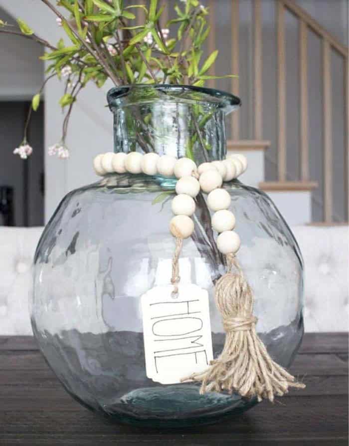 Add Glamour with a Wooden Bead Garland with Tassel Tag